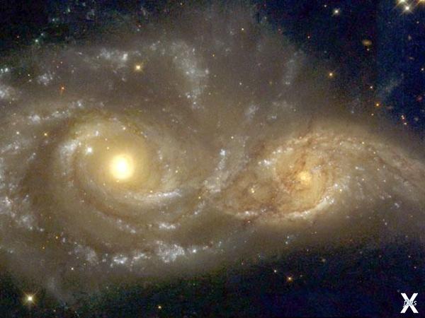 Столкновение галактик NGC 2207 и IC 2...