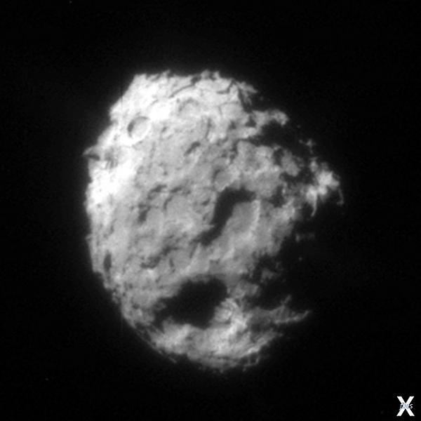 Комета Wild 2, сфотографированная зон...