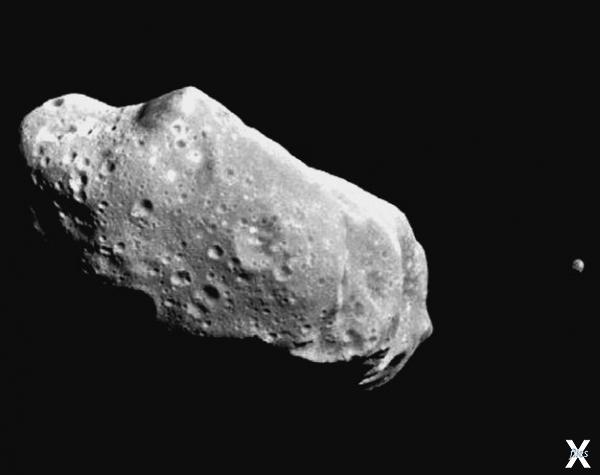 Один из многочисленных астероидов, не...
