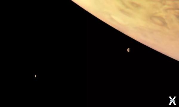 Юпитер и его спутники Ио и Европа