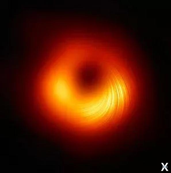Первое в истории фото черной дыры, на...