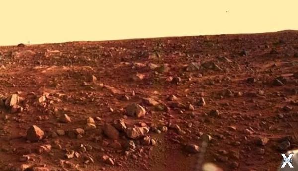 Одна из фотографий поверхности Марса,...