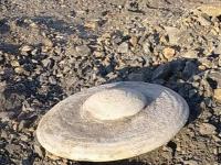 На кузбасском разрезе нашли загадочные каменные диски