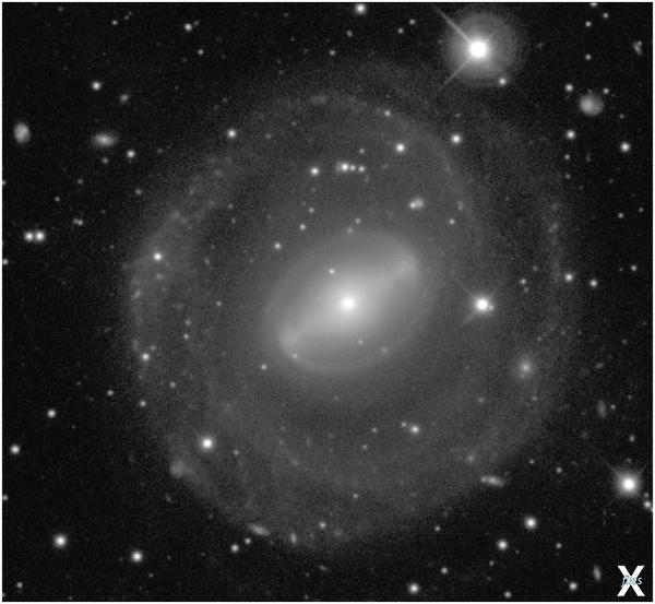 Галактика NGC 5101, содержащая газовы...