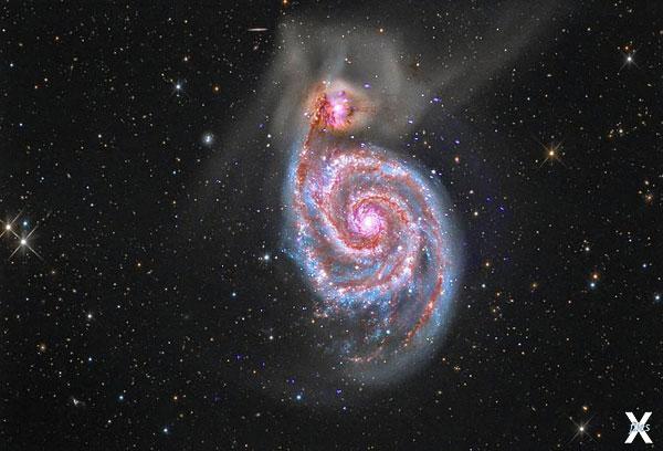 Так выглядит спиральная галактика M51...